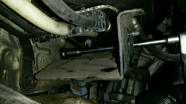 BMW E90 fuel and brake line cover removal