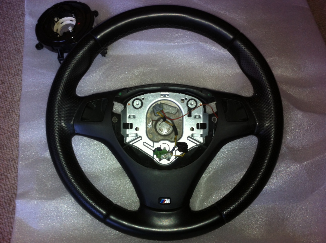 Name:  335i steering wheel.jpg
Views: 2000
Size:  434.7 KB